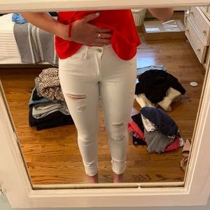 High waisted ripped white jeans